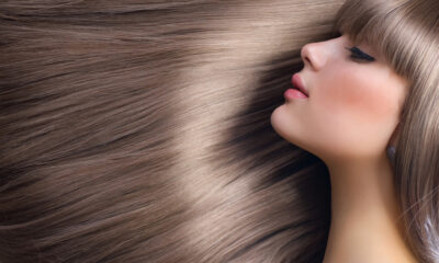 Donna con capelli lunghi (© Depositphotos)